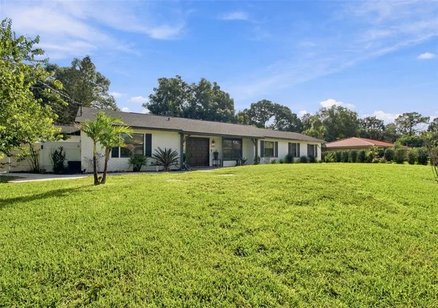 Photo 2 of Single family home for sale at 7913 Flowerfield Dr, Tampa, FL 33615 | MLS# TB8561958 | Listing updated on 2026-10-30