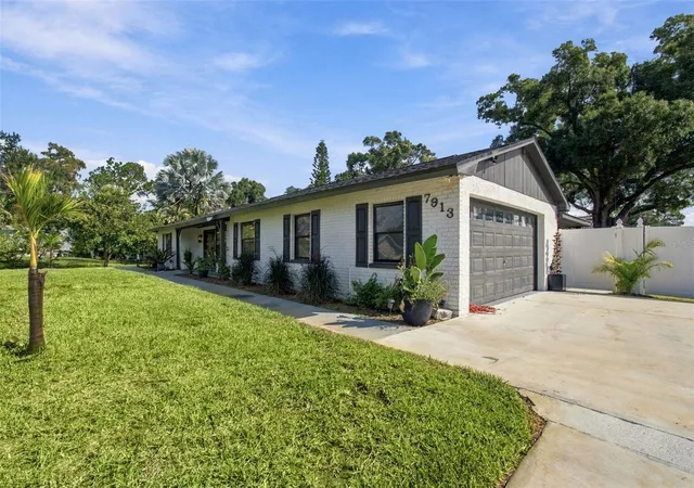 Photo 3 of Single family home for sale at 7913 Flowerfield Dr, Tampa, FL 33615 | MLS# TB8561958 | Listing updated on 2026-10-30
