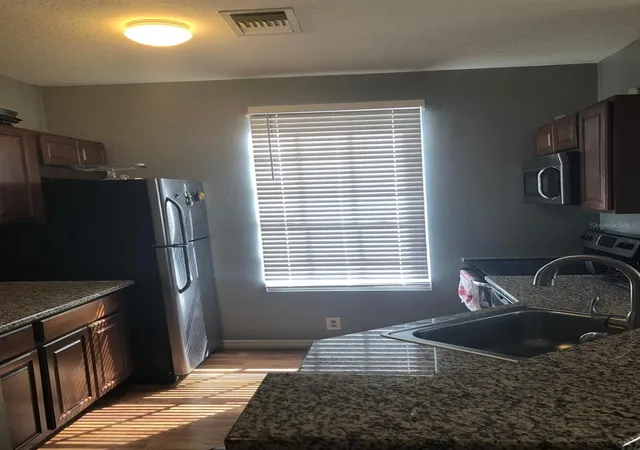 Photo 3 of Condo for sale at 6380 Raleigh St #2101, Orlando, FL 32835 | MLS# O6453168 | Listing updated on 2026-10-28