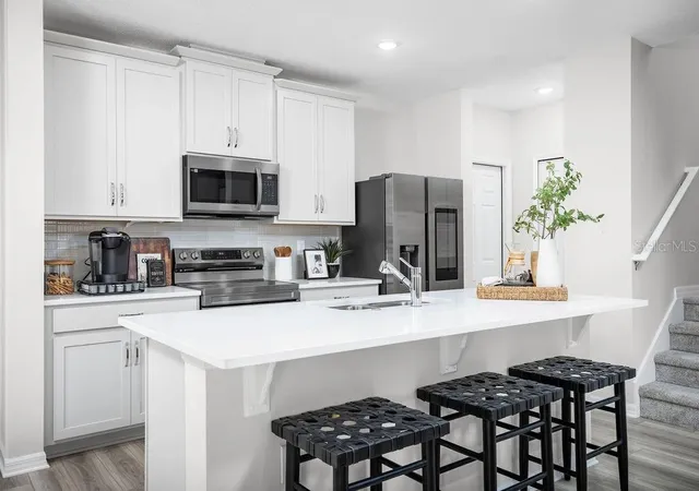 Photo 2 of Townhouse for sale at 327 Thompson Village Ave, Apopka, FL 32703 | MLS# O6453169 | Listing updated on 2026-10-28