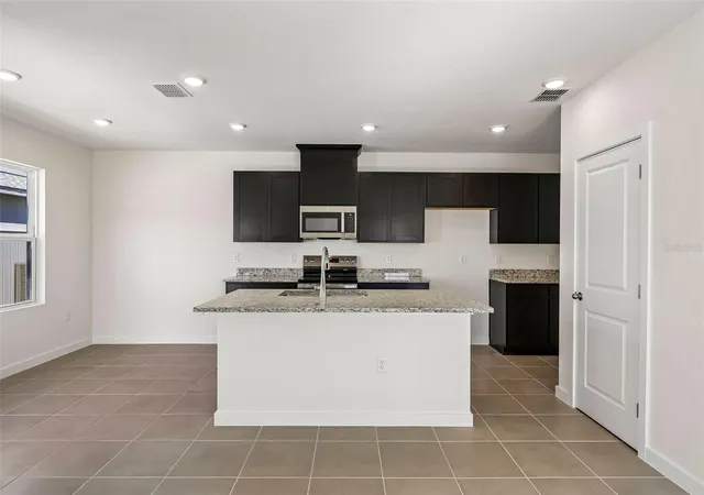 Photo 1 of Townhouse for sale at 2732 Meadow Crst Dr, Harmony, FL 34773 | MLS# O6453181 | Listing updated on 2026-10-28
