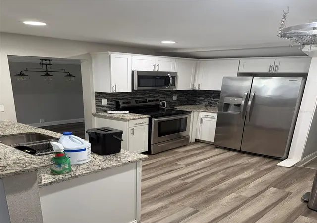 Photo 4 of Single family home for sale at 4915 W Bartlett Dr, Tampa, FL 33603 | MLS# A4711057 | Listing updated on 2026-10-29