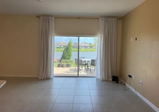 Photo 3 of Townhouse for sale at 1345 Anchor Bnd Way, Kissimmee, FL 34746 | MLS# O6453198 | Listing updated on 2026-10-28