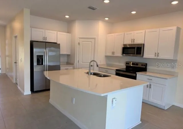 Photo 4 of Townhouse for sale at 1345 Anchor Bnd Way, Kissimmee, FL 34746 | MLS# O6453198 | Listing updated on 2026-10-28