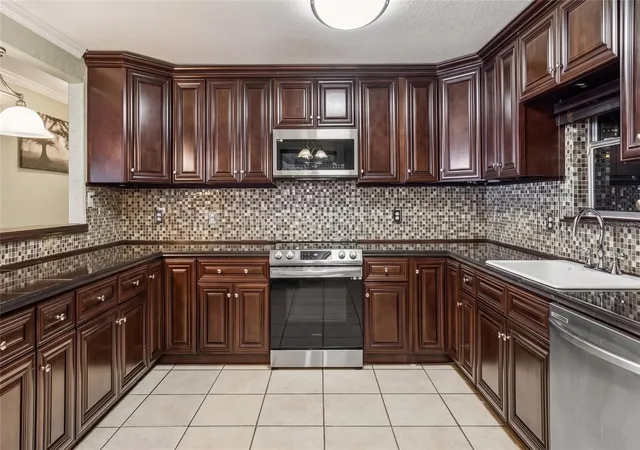 Photo 2 of Single family home for sale at 3105 Gordon Ct, Tampa, FL 33619 | MLS# TB8562127 | Listing updated on 2026-10-29