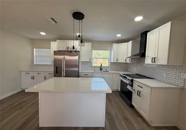Photo 3 of Single family home for sale at 723 S Combee Rd, Lakeland, FL 33801 | MLS# TB8562143 | Listing updated on 2026-10-28