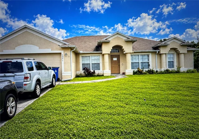 Photo 1 of Single family home for sale at 1371 Armory Dr NE, Palm Bay, FL 32907 | MLS# TB8562163 | Listing updated on 2026-10-30