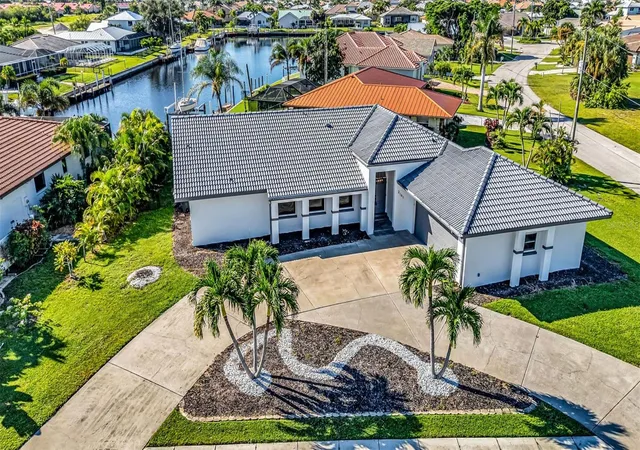 Single family home for sale at 2161 Aqui Esta Dr, PUNTA GORDA, FL 33950 | MLS# C7532622
