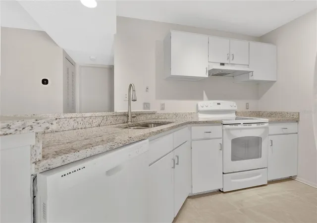 Listing Photo 1 - Condo for sale in building located at 115 112Th Ave Ne, St. Petersburg, FL 33716 - Unit #617