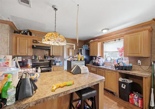 Photo 2 of Manufactured home for sale at 39522 River Rd, Dade City, FL 33525 | MLS# W7890699 | Listing updated on 2026-10-29