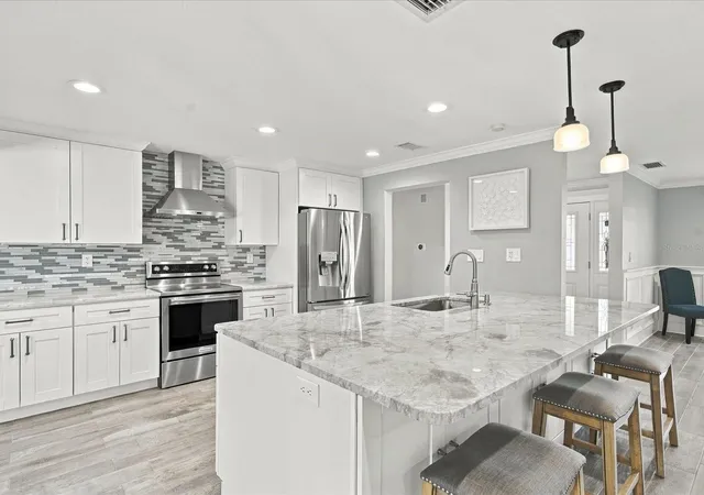 Photo 3 of Single family home for sale at 10469 Imperial Point Dr E, Largo, FL 33774 | MLS# TB8562296 | Listing updated on 2026-10-29