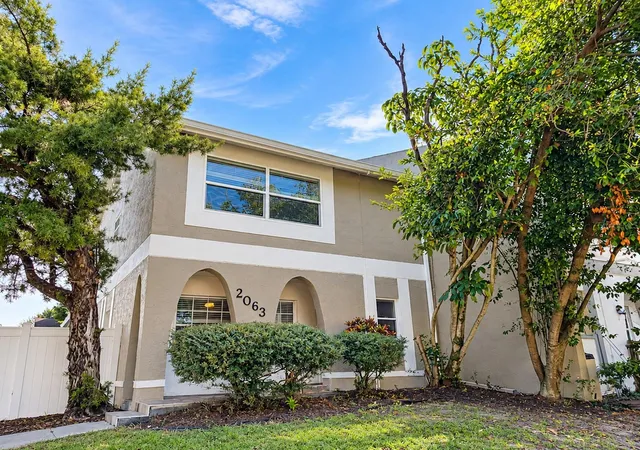 Photo 1 of Townhouse for sale at 2063 Los Lomas Dr, Clearwater, FL 33763 | MLS# TB8562348 | Listing updated on 2026-10-29