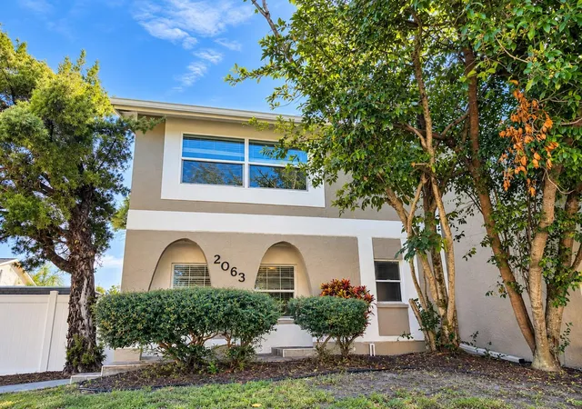 Photo 1 of Townhouse for sale at 2063 Los Lomas Dr, Clearwater, FL 33763 | MLS# TB8562348 | Listing updated on 2026-10-29