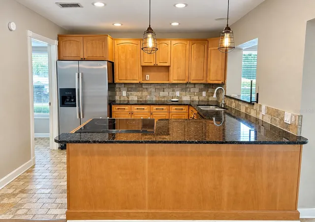 Photo 3 of Townhouse for sale at 2063 Los Lomas Dr, Clearwater, FL 33763 | MLS# TB8562348 | Listing updated on 2026-10-29