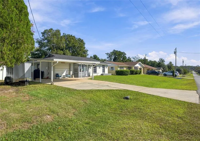 Photo 1 of Single family home for sale at 21485 SW Raintree St, Dunnellon, FL 34431 | MLS# OM734840 | Listing updated on 2026-10-30
