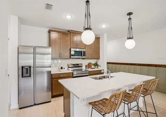 Photo 1 of Townhouse for sale at 287 Thompson Village Ave, Apopka, FL 32703 | MLS# O6453401 | Listing updated on 2026-10-29