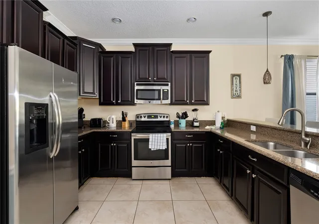 Photo 2 of Single family home for sale at 1520 Moon Valley Dr, Davenport, FL 33896 | MLS# O6453459 | Listing updated on 2026-10-30