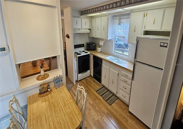Photo 1 of Manufactured home for sale at 14153 SE 93rd Terrace, Summerfield, FL 34491 | MLS# OM734859 | Listing updated on 2026-10-29