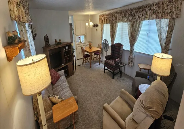 Photo 2 of Manufactured home for sale at 14153 SE 93rd Terrace, Summerfield, FL 34491 | MLS# OM734859 | Listing updated on 2026-10-29