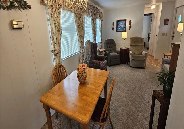Photo 3 of Manufactured home for sale at 14153 SE 93rd Terrace, Summerfield, FL 34491 | MLS# OM734859 | Listing updated on 2026-10-29