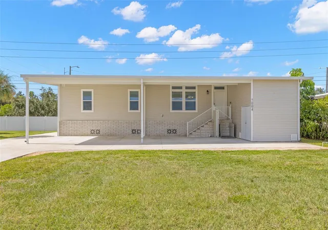 Photo 1 of Manufactured home for sale at 7004 Americana Dr Ne #136, Saint Petersburg, FL 33702 | MLS# TB8562505 | Listing updated on 2026-10-29