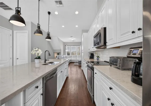 Photo 4 of Townhouse for sale at 716 Grado Point, Oviedo, FL 32765 | MLS# O6453557 | Listing updated on 2026-10-29