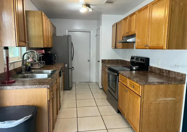 Photo 3 of Single family home for sale at 12849 Montana Woods Ln, Orlando, FL 32824 | MLS# S5160407 | Listing updated on 2026-10-30