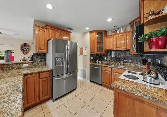 Photo 1 of Single family home for sale at 5002 Halifax Dr, Tampa, FL 33615 | MLS# TB8562646 | Listing updated on 2026-10-29