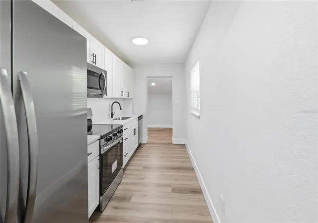 Photo 3 of Single family home for sale at 705 E Eskimo Ave, Tampa, FL 33604 | MLS# TB8562679 | Listing updated on 2026-10-30