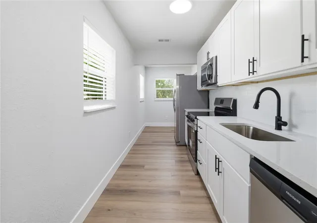 Photo 4 of Single family home for sale at 705 E Eskimo Ave, Tampa, FL 33604 | MLS# TB8562679 | Listing updated on 2026-10-30