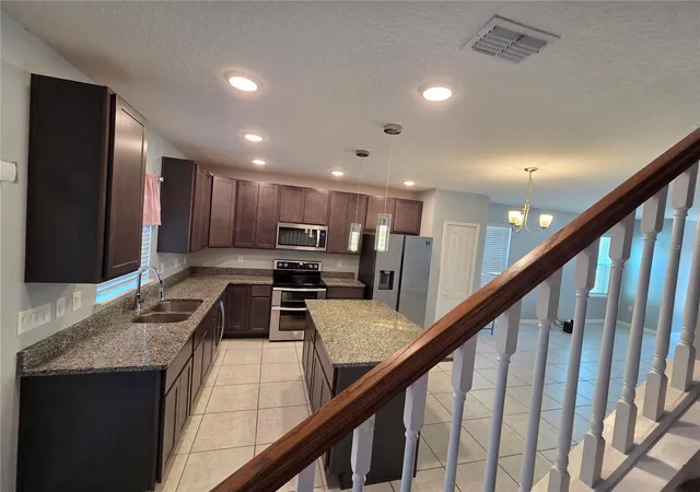 Photo 1 of Single family home for sale at 2213 Cyn Breeze Ave, Kissimmee, FL 34746 | MLS# TB8562700 | Listing updated on 2026-10-30