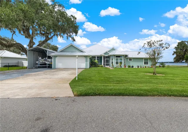 Single family home for sale at 1425 Lake Lotela Dr, AVON PARK, FL 33825 | MLS# W7890749