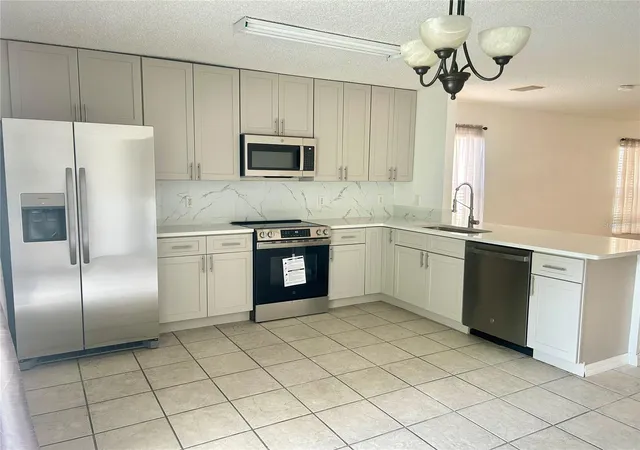 Photo 3 of Single family home for sale at 1030 Crystal Bay Ln, Orlando, FL 32828 | MLS# O6453673 | Listing updated on 2026-10-30
