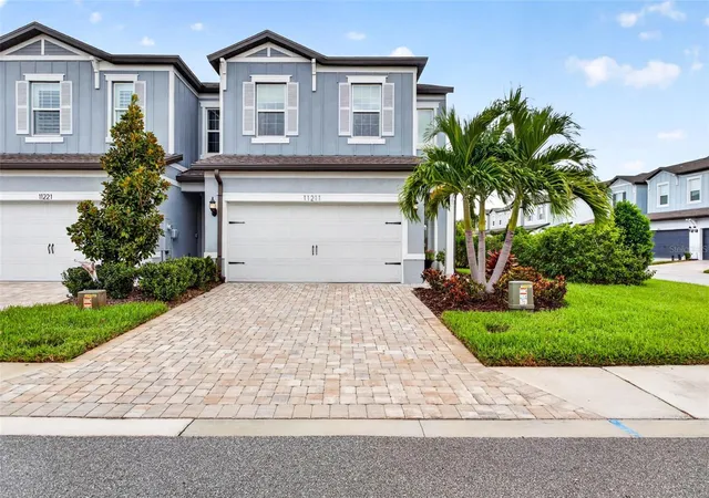Photo 1 of Townhouse for sale at 11211 Beach Walk Way Ne, Saint Petersburg, FL 33716 | MLS# TB8562755 | Listing updated on 2026-10-30