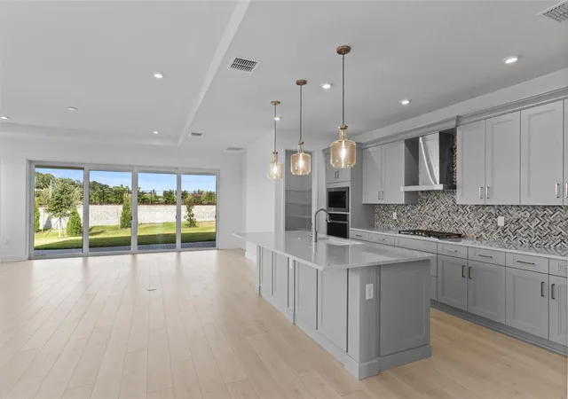 Photo 3 of Single family home for sale at 557 Hammock Oaks Blvd, Lady Lake, FL 32159 | MLS# W7890757 | Listing updated on 2026-10-29