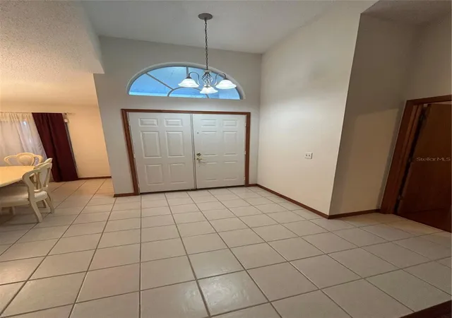 Photo 3 of Single family home for sale at 6713 Knightswood Dr, Orlando, FL 32818 | MLS# O6453700 | Listing updated on 2026-10-31