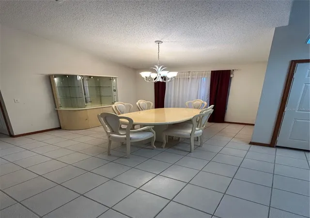 Photo 4 of Single family home for sale at 6713 Knightswood Dr, Orlando, FL 32818 | MLS# O6453700 | Listing updated on 2026-10-31