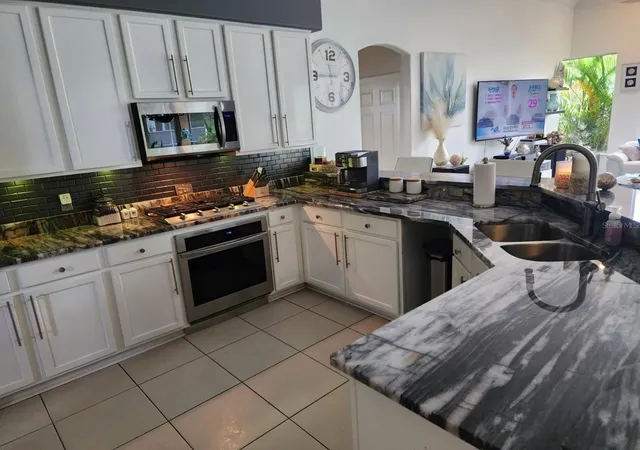 Photo 2 of Single family home for sale at 10532 Cory Lake Dr, Tampa, FL 33647 | MLS# TB8562816 | Listing updated on 2026-10-30