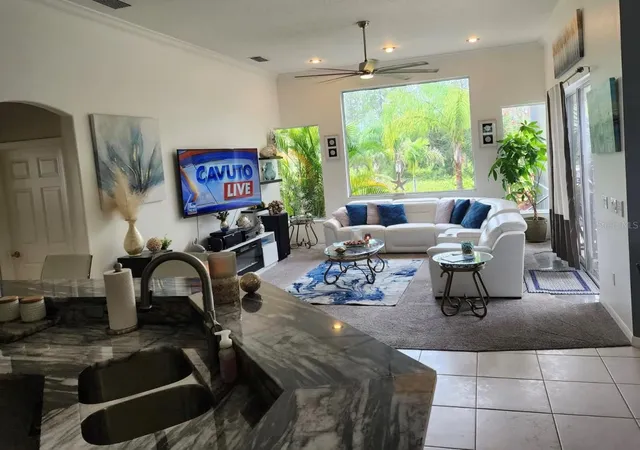 Photo 3 of Single family home for sale at 10532 Cory Lake Dr, Tampa, FL 33647 | MLS# TB8562816 | Listing updated on 2026-10-30