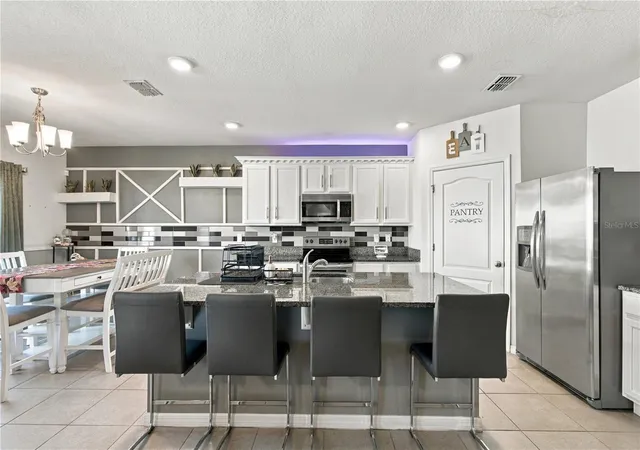 Photo 4 of Single family home for sale at 265 Ludisia Loop, Davenport, FL 33837 | MLS# S5160463 | Listing updated on 2026-10-29