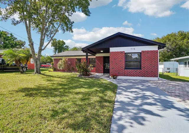 Photo 2 of Single family home for sale at 715 Papaya Dr, Tampa, FL 33619 | MLS# TB8562902 | Listing updated on 2026-10-30