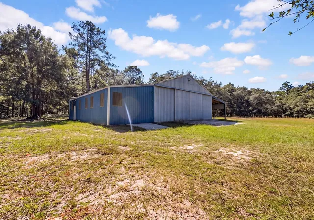 Photo 1 of Manufactured home for sale at 12150 NE 111th Avenue, Archer, FL 32618 | MLS# OM734936 | Listing updated on 2026-10-30