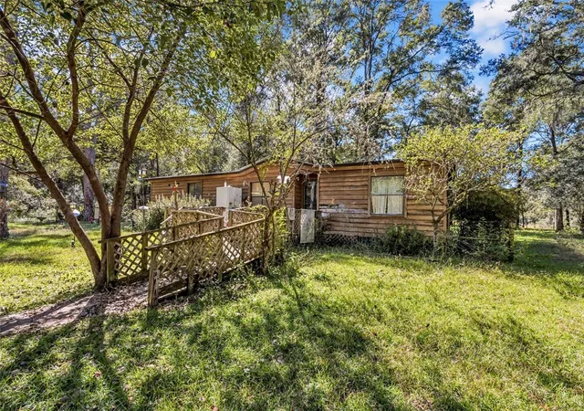 Photo 4 of Manufactured home for sale at 12150 NE 111th Avenue, Archer, FL 32618 | MLS# OM734936 | Listing updated on 2026-10-30