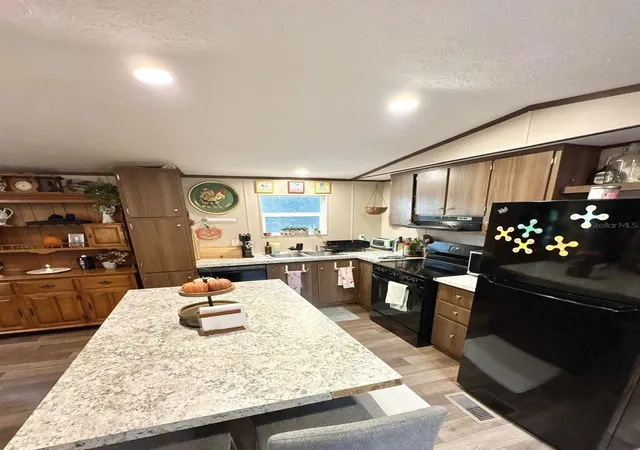 Photo 1 of Manufactured home for sale at 10760 NE 114th Street, Archer, FL 32618 | MLS# O6453815 | Listing updated on 2026-10-30