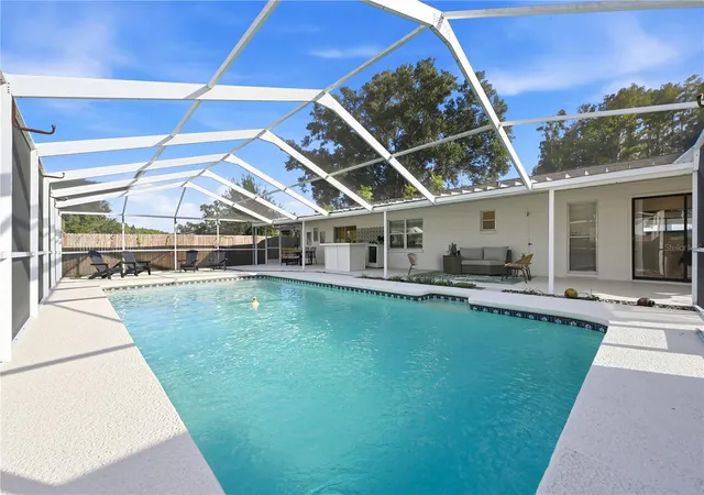 Photo 4 of Single family home for sale at 4303 Hollow Hl Dr, Tampa, FL 33624 | MLS# TB8562992 | Listing updated on 2026-10-30