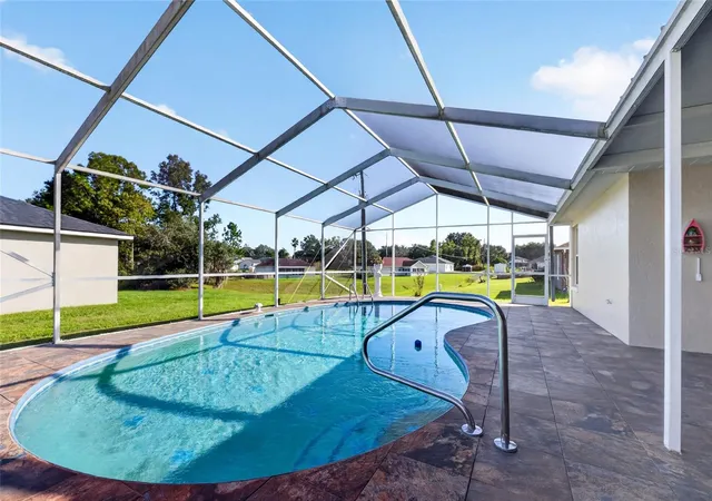 Photo 2 of Single family home for sale at 2831 SW 139th Street, Ocala, FL 34473 | MLS# OM734974 | Listing updated on 2026-10-30