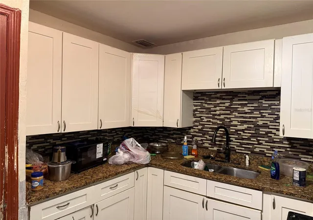 Photo 4 of Single family home for sale at 904 Governors Ave, Orlando, FL 32808 | MLS# O6453964 | Listing updated on 2026-10-30