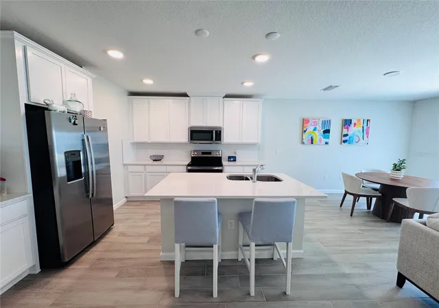 Photo 1 of Townhouse for sale at 4413 Campsite Loop, Orlando, FL 32824 | MLS# O6454025 | Listing updated on 2026-10-30