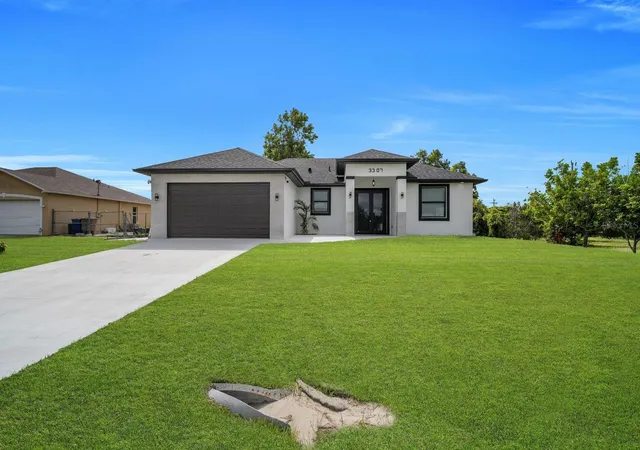 Photo 1 of Single family home for sale at 3307 7th Street Sw, Lehigh Acres, FL 33976 | MLS# A4711455 | Listing updated on 2026-10-30