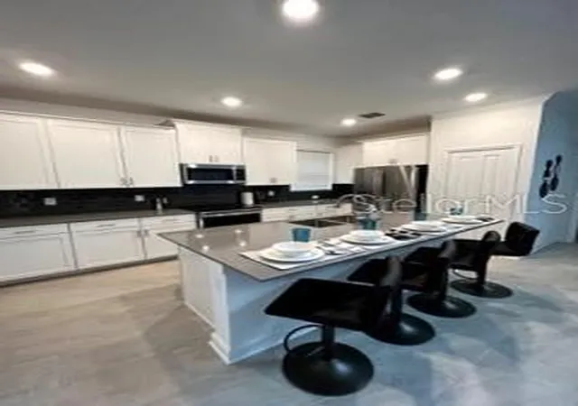 Photo 2 of Single family home for sale at 961 Leader St, Davenport, FL 33896 | MLS# O6454122 | Listing updated on 2026-10-31